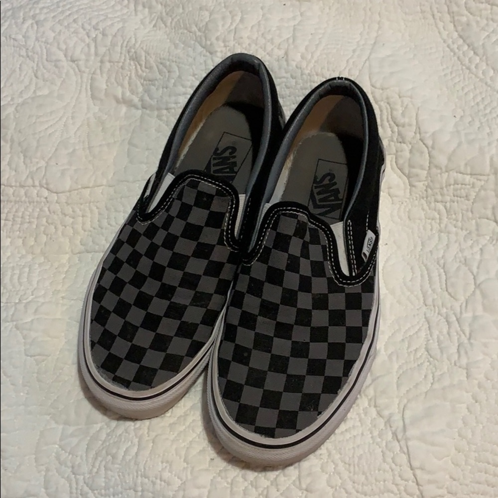 Black and gray checkered slip-on Vans